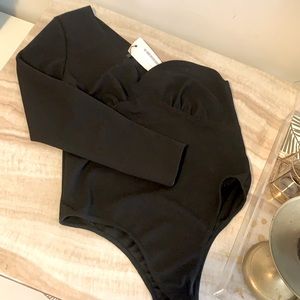 One sleeve, asymmetrical black body suit